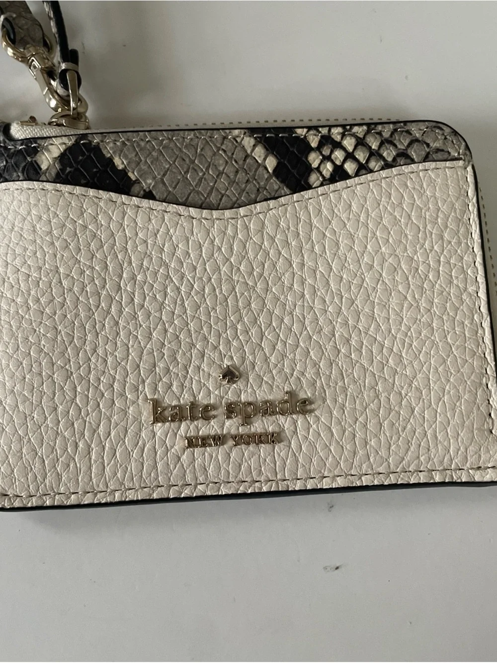 kate spade Cream Pebbled Wristlet with Snake-Print Trim